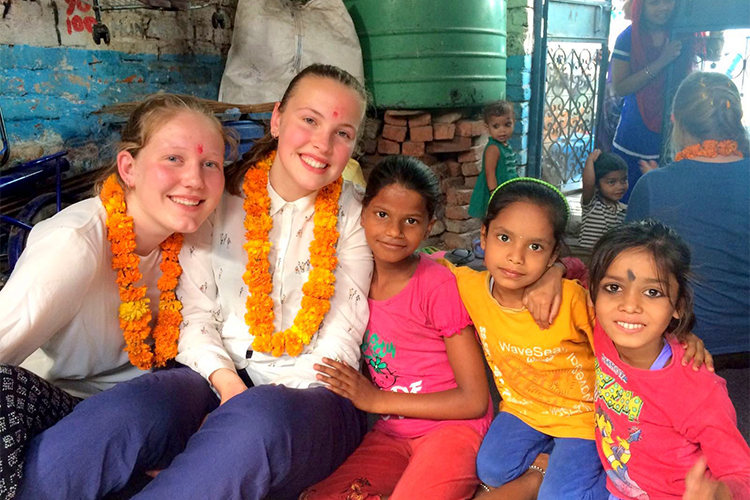 Students from a school group in Holland with children in Delhi, India